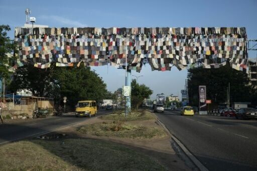 Ghana artist's billboard campaign takes aim at fast fashion fallout