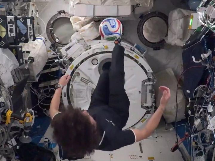 Astronaut does bicycle kick in space during soccer science lesson