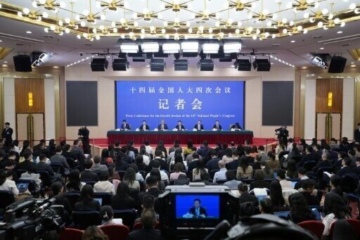 China says 'clearly aware' of economic risks, vows to boost spending