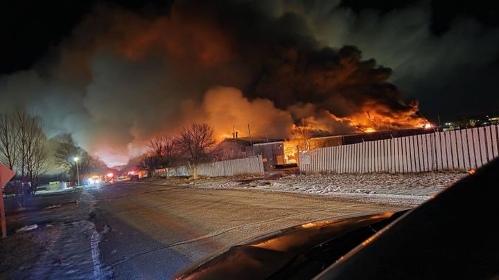 Poplar Volunteer Fire Department battling overnight warehouse fire