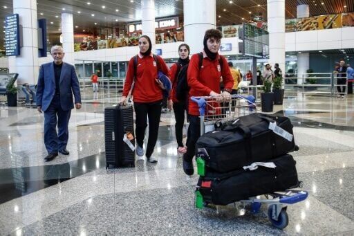 Three Iranian football team members leave asylum in Australia