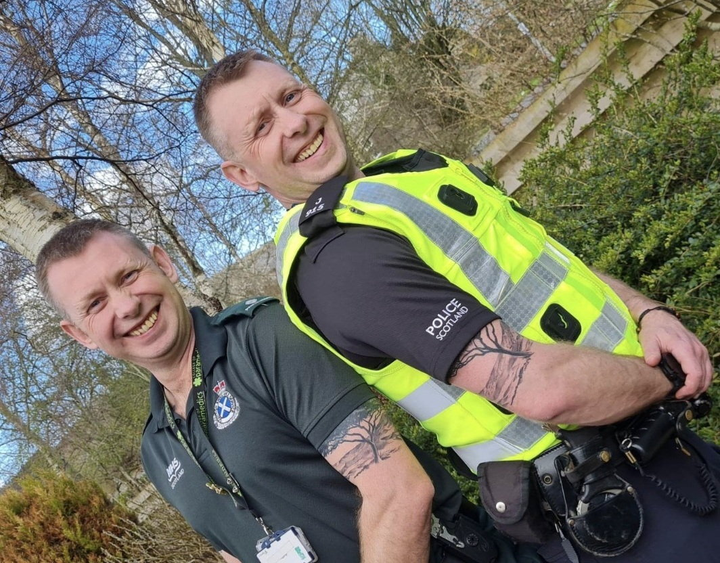 Identical twins celebrate over 20 years in emergency services