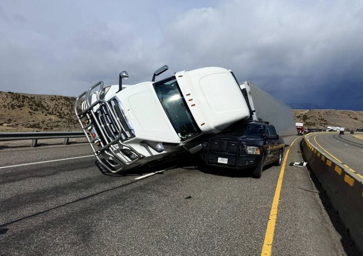 Park County deputy hit by blown over semi truck while responding to separate blown over semi truck