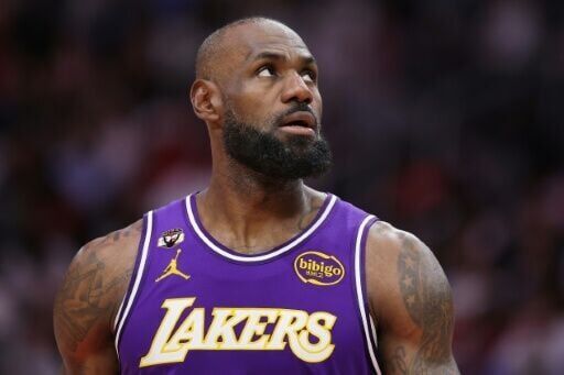James ties NBA record for most regular-season games in latest milestone