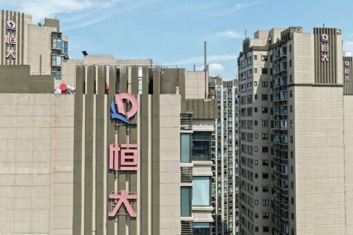 Founder of China's Evergrande pleads guilty to fraud
