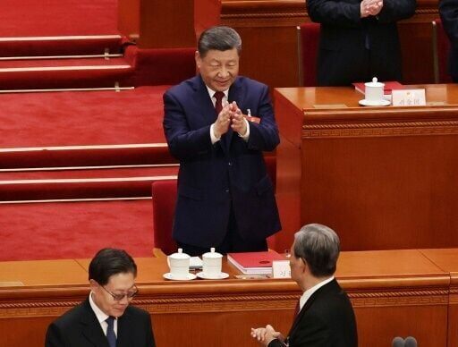 China's leaders project stability despite Middle East war