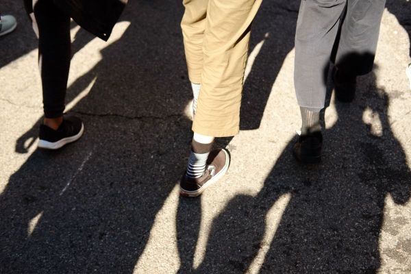 Feet marching, shadow of your photographer.