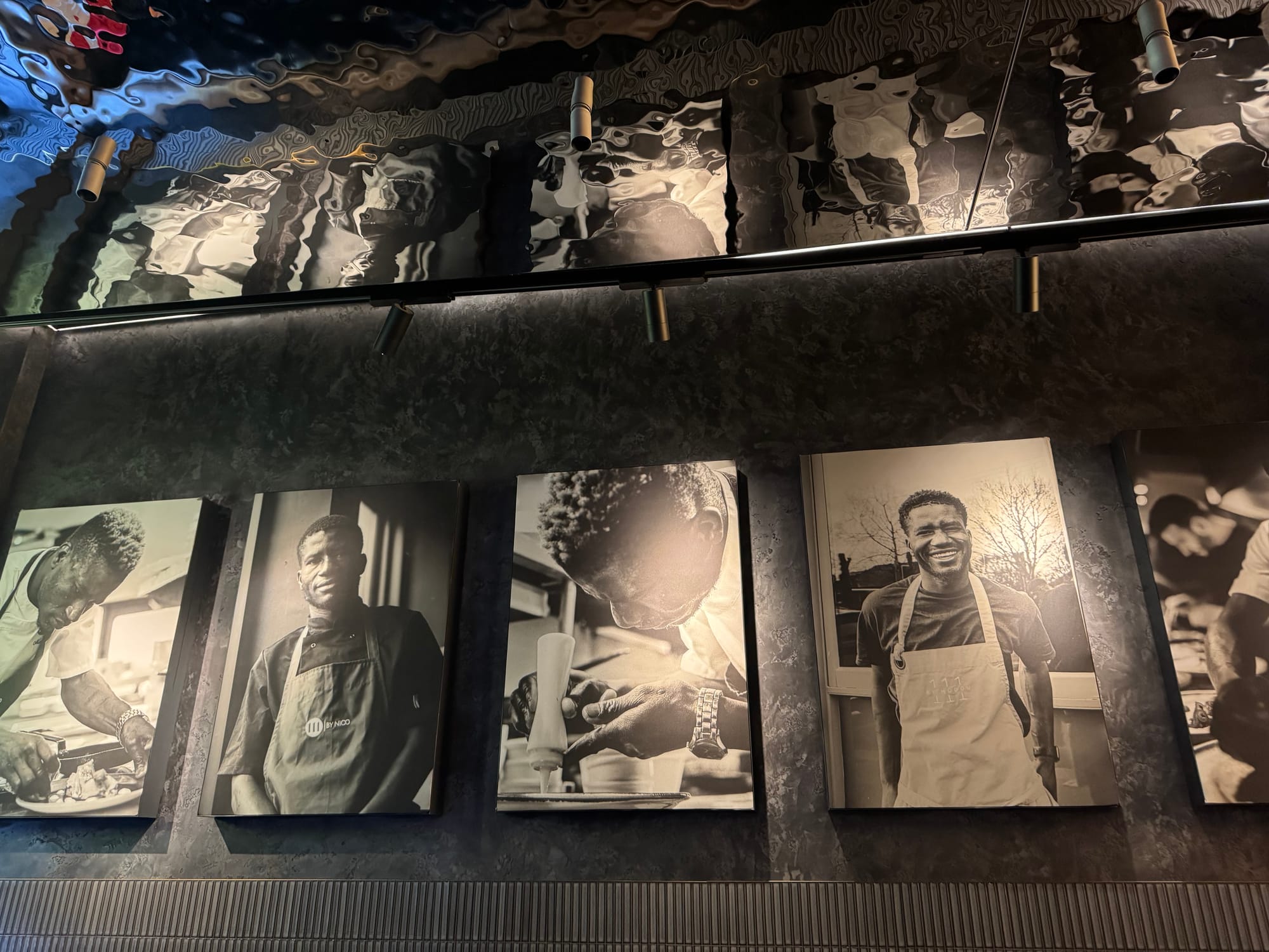 Five canvases showing chef Modou Diagne throughout his culinary career.