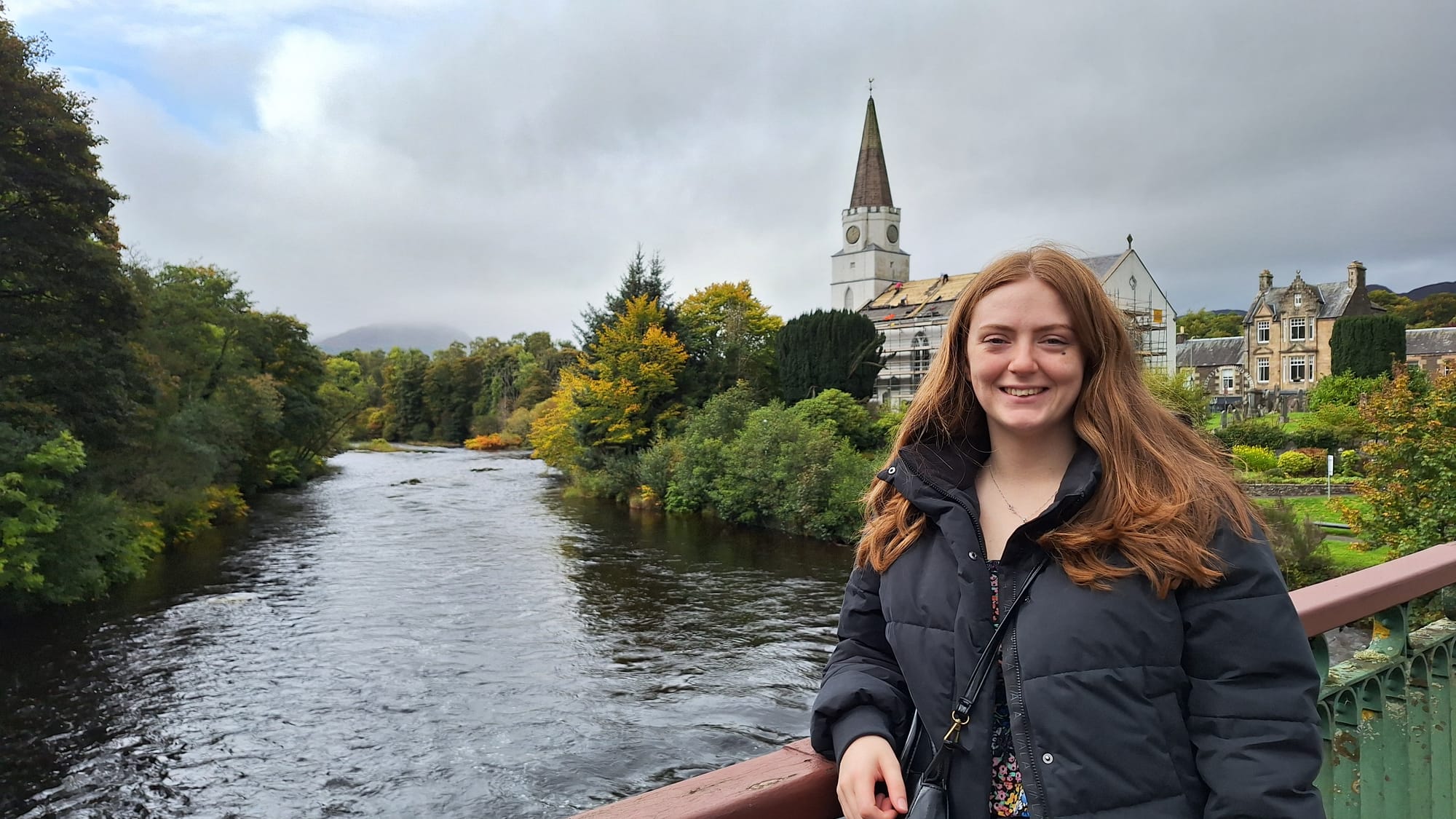 Beth smiles on the bridge leading into Comrie.