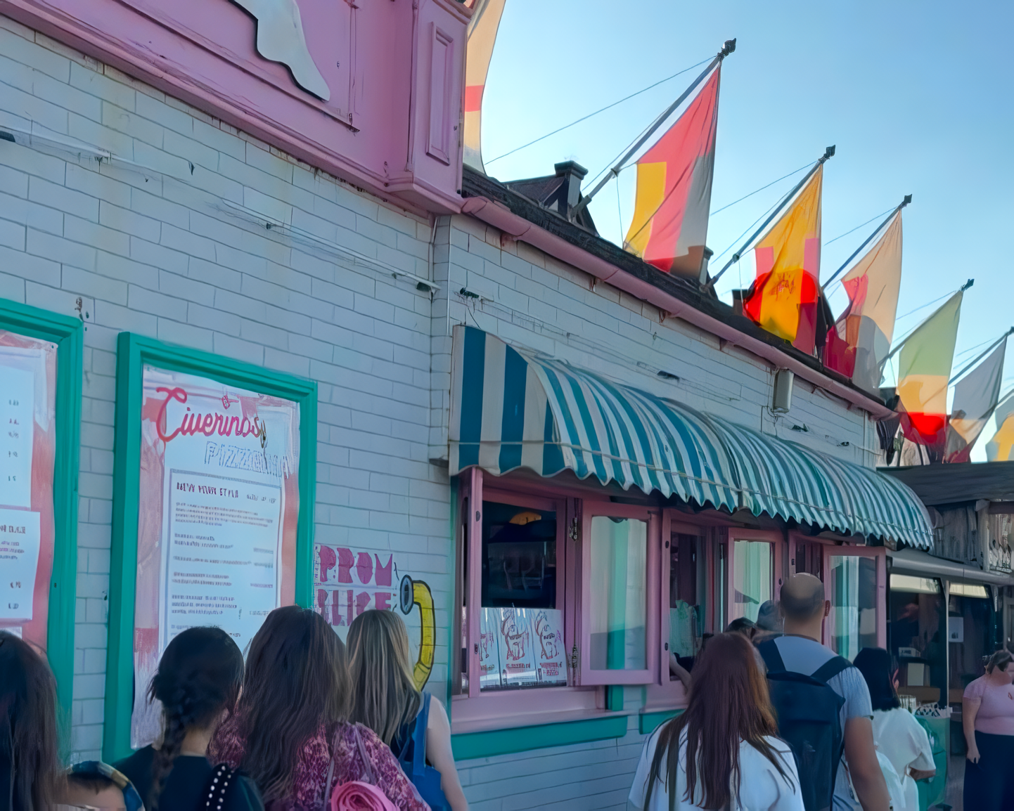 Civerinos Portobello branch. It has a white exterior and striped awning.