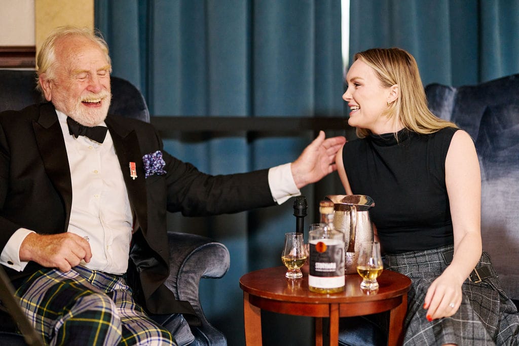 Iona speaking with Scots actor James Cosmo at a Keepers of the Quaich event in NYC.