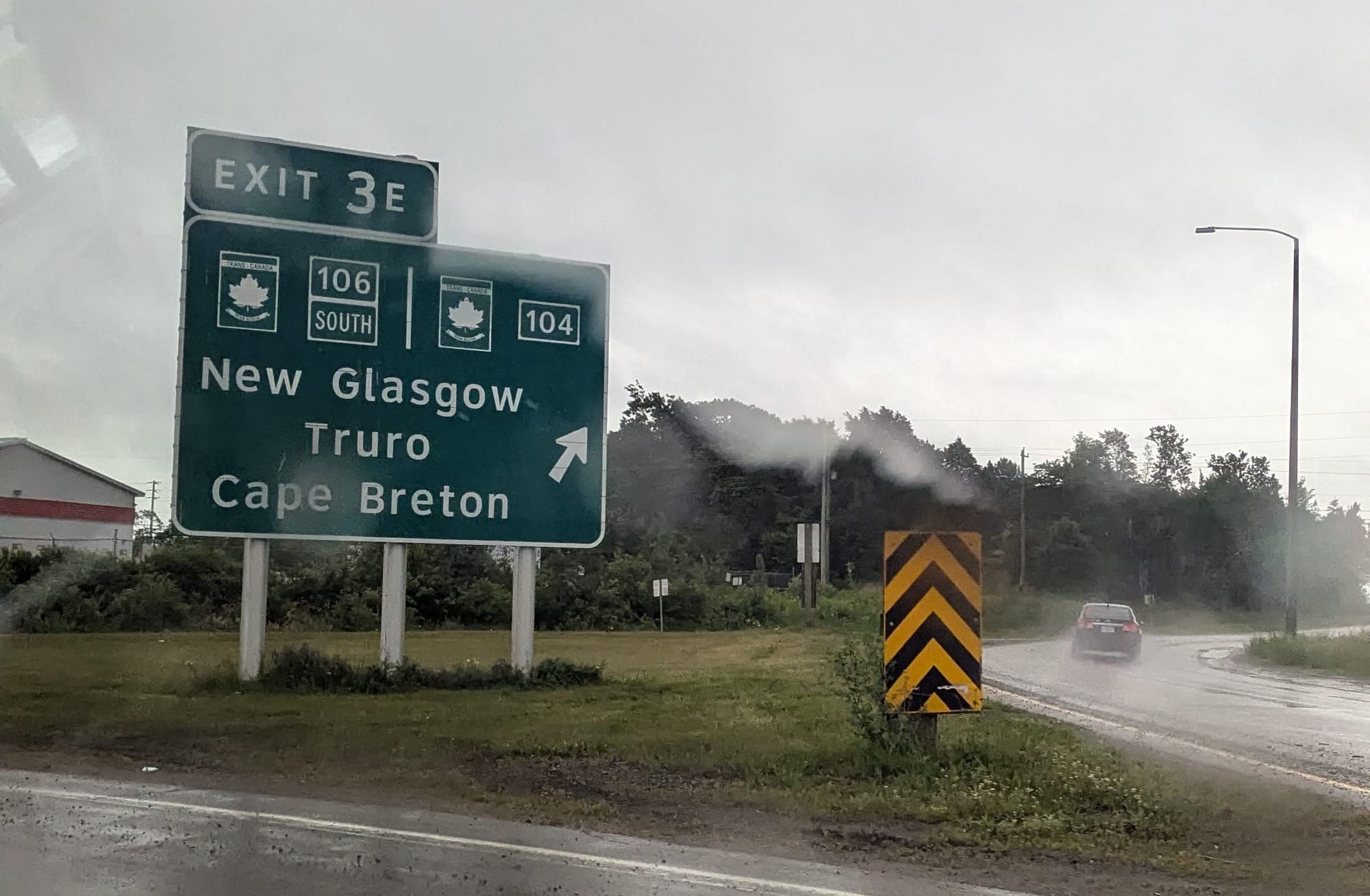 A road sign reading "New Glasgow".