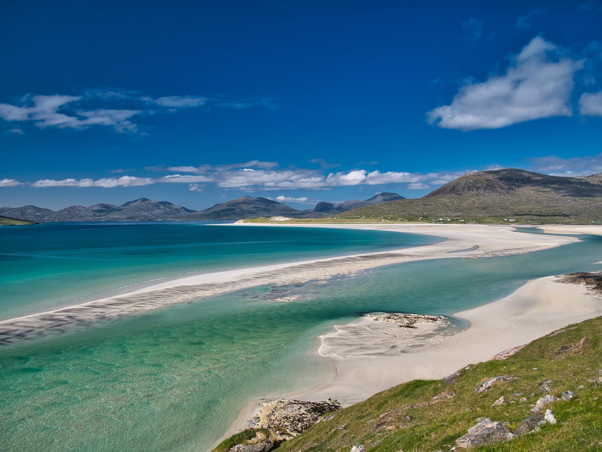 Bright blue and green seas next to a white sand beach at Luskentyre on Harris.