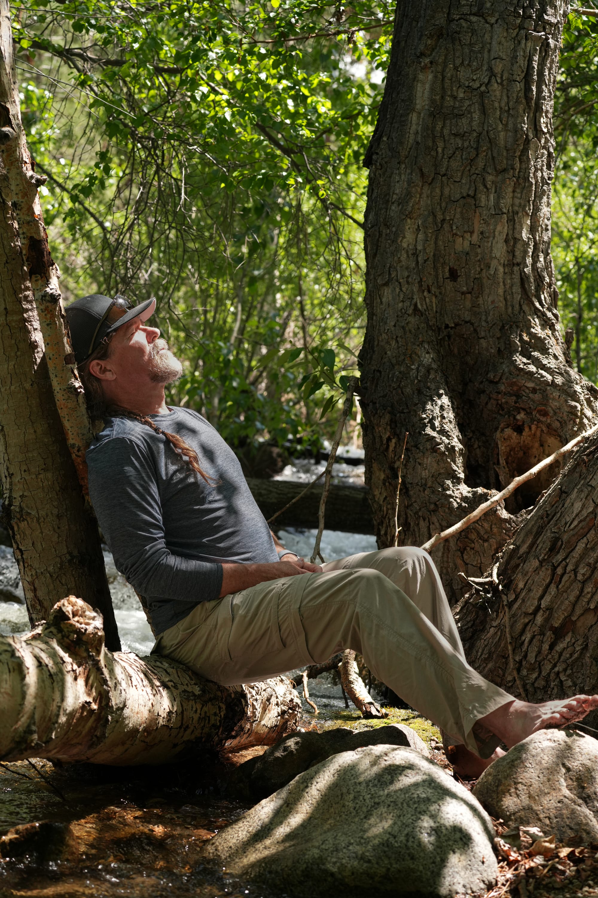 relaxing by creek