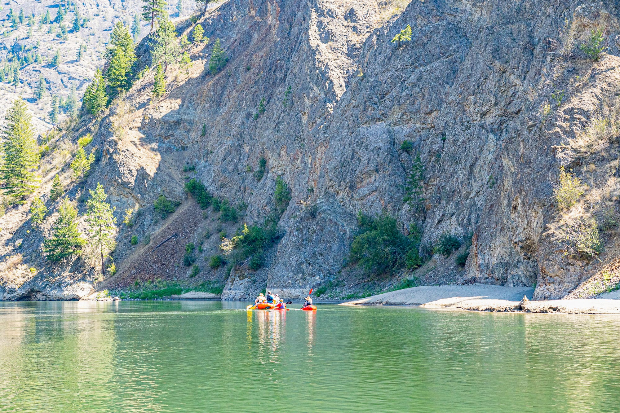people rafting on a river