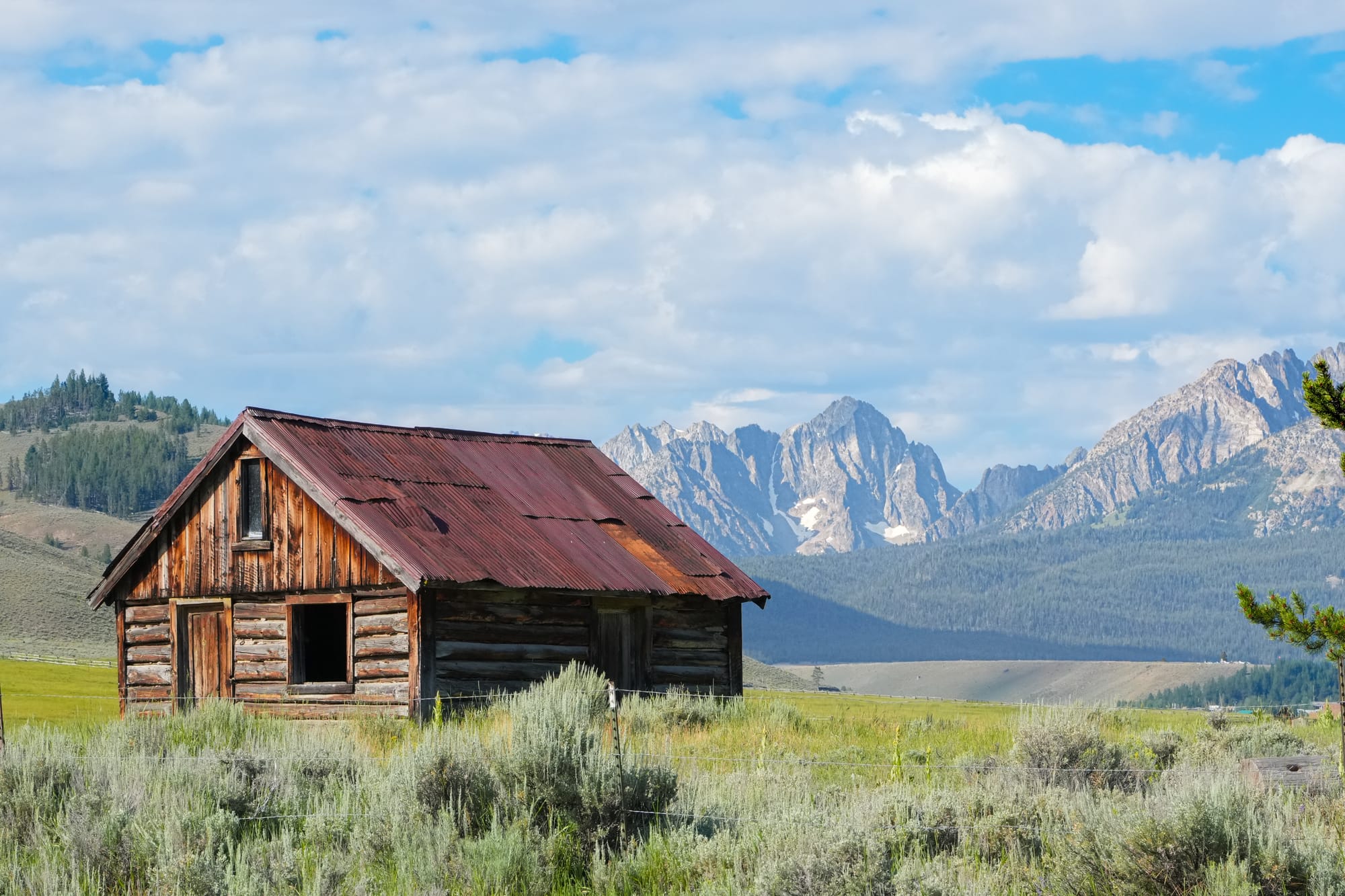 farmhouse and mountains