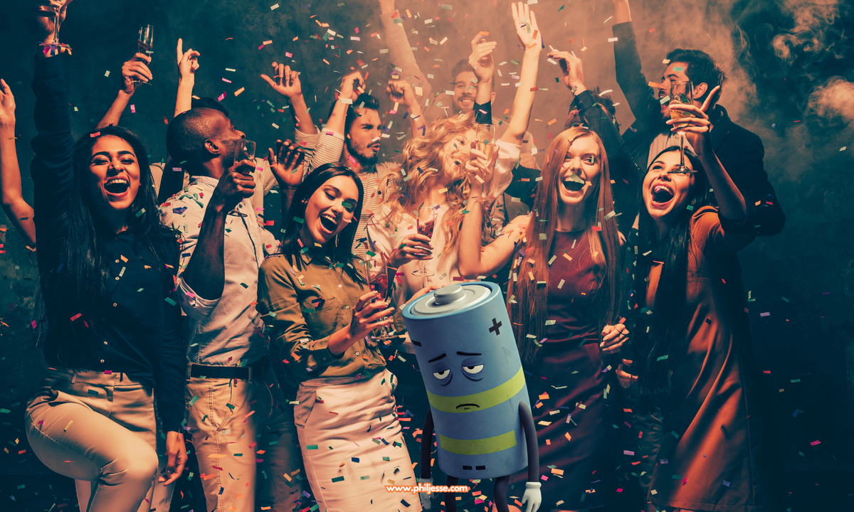 Sad, tired cartoon battery character, half full in a party crowd, symbolising a social hangover.