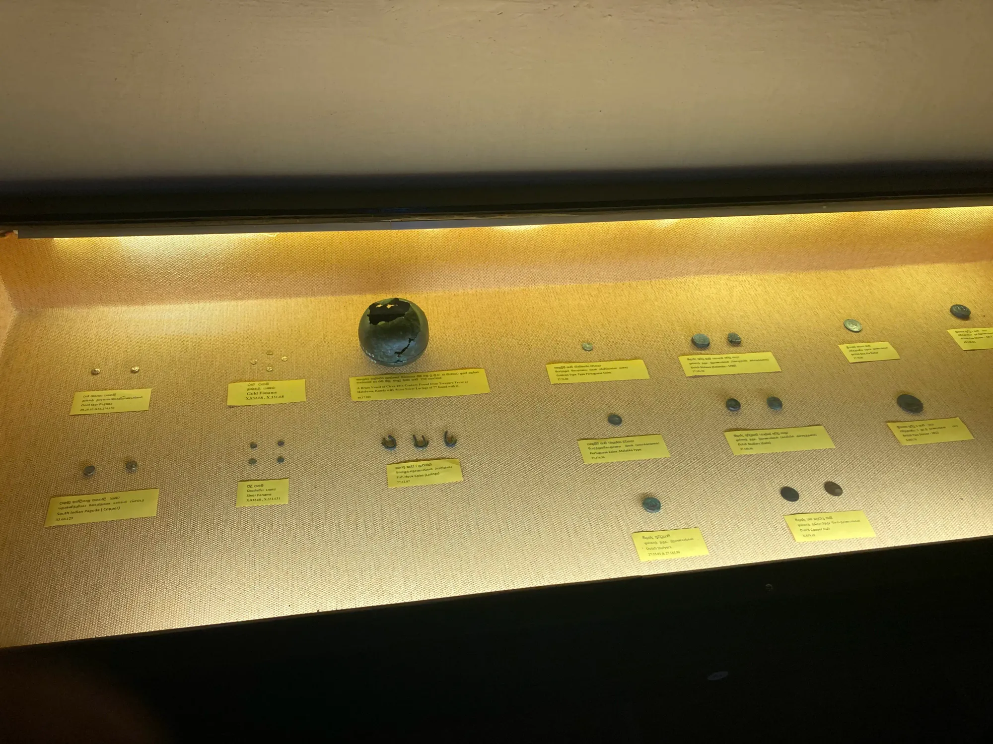 Sri Lankan coins used throughout history, displayed at the Kandy National Museum