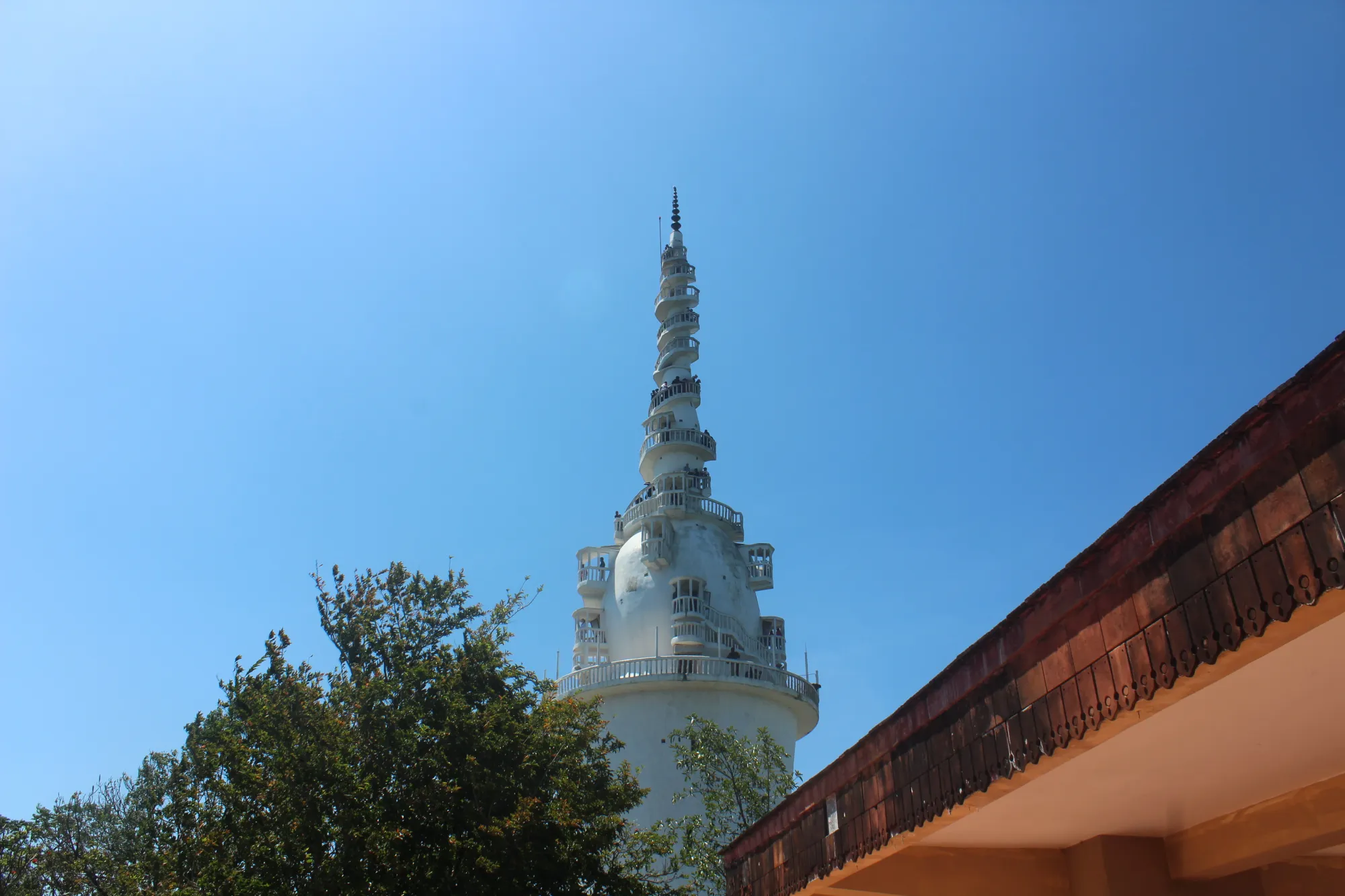A Ambuluwawa Tower in Sri Lanka seen from a short distance away
