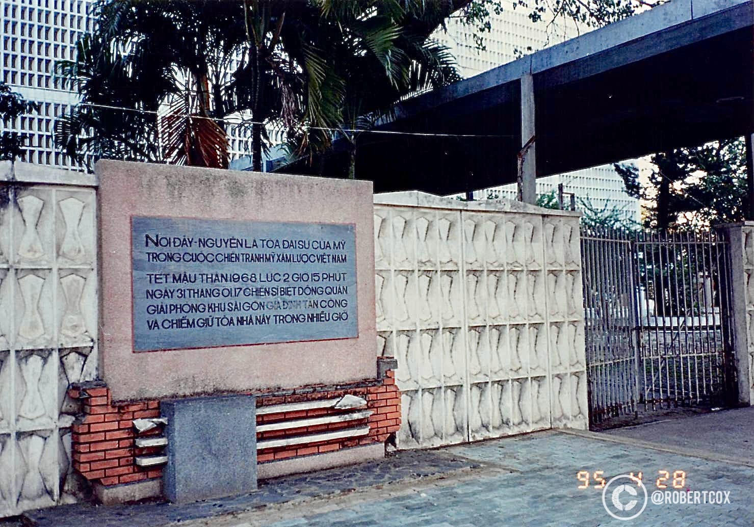 A commemorative plaque stood outside the former U.S. Embassy in Saigon, now part of the U.S. Consulate in Ho Chi Minh City, Vietnam. The plaque, written in Vietnamese, translates to: "This is the dangerous location of the U.S. Embassy during the Vietnam War. During the Tet Offensive of 1968 at 2:15 AM on January 31, the Nghia Phong Special Forces Unit of the Saigon area caused significant damage to the enemy and occupied this important American base for several hours." I have no idea where that plaque is now. The geometric-patterned wall and gate, since torn down, were near Le Duan Street in District 1.
