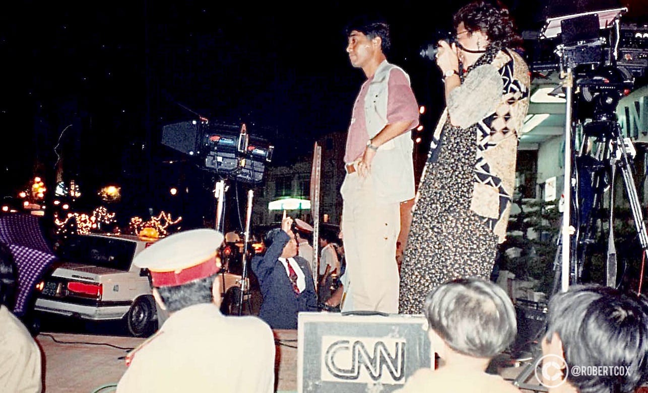 A CNN news crew set up on the square near the Ho Chi Minh City Hall, also known as the Saigon City Hall or the Ho Chi Minh City People’s Committee Headquarters, in Ho Chi Minh City, Vietnam where CNN broadcast from all week. It was these broadcasts that led me to make the impromptu trip to Vietnam for the 20th Anniversary of the Fall of Saigon.