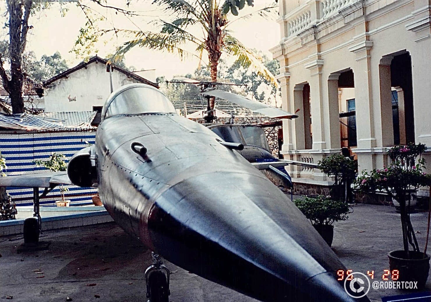 A captured F-5E Tiger II, part of outdoor displays at the War Remnants Museum in Ho Chi Minh City, Vietnam. This museum, originally called the "Exhibition House for US and Puppet Crimes" when it opened in 1975, was later renamed the War Remnants Museum in 1995 after the normalization of U.S.-Vietnam relations. It is often referred to as the "American War Museum" by visitors due to its focus on the Vietnam War, known locally as the "American War." (April 28, 1995).