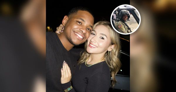 Stephanie Kenny-Velasquez and her husband Christopher Busby, an Army reservist and Black Hawk pilot, smiling together.