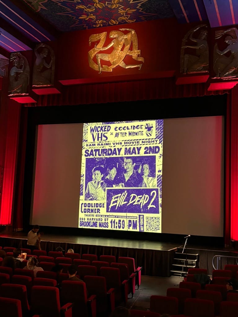 photo of a movie screen at The Coolidge Corner Theatre advertising the evening's midnight VHS screening of Evil Dead 2