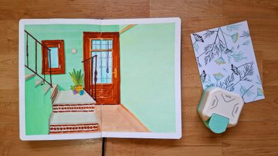 A gouache sketch of an entryway with mint green walls, a tiled staircase, plants and a wooden window and door. An edge cutter and a white card with plant illustrations. 