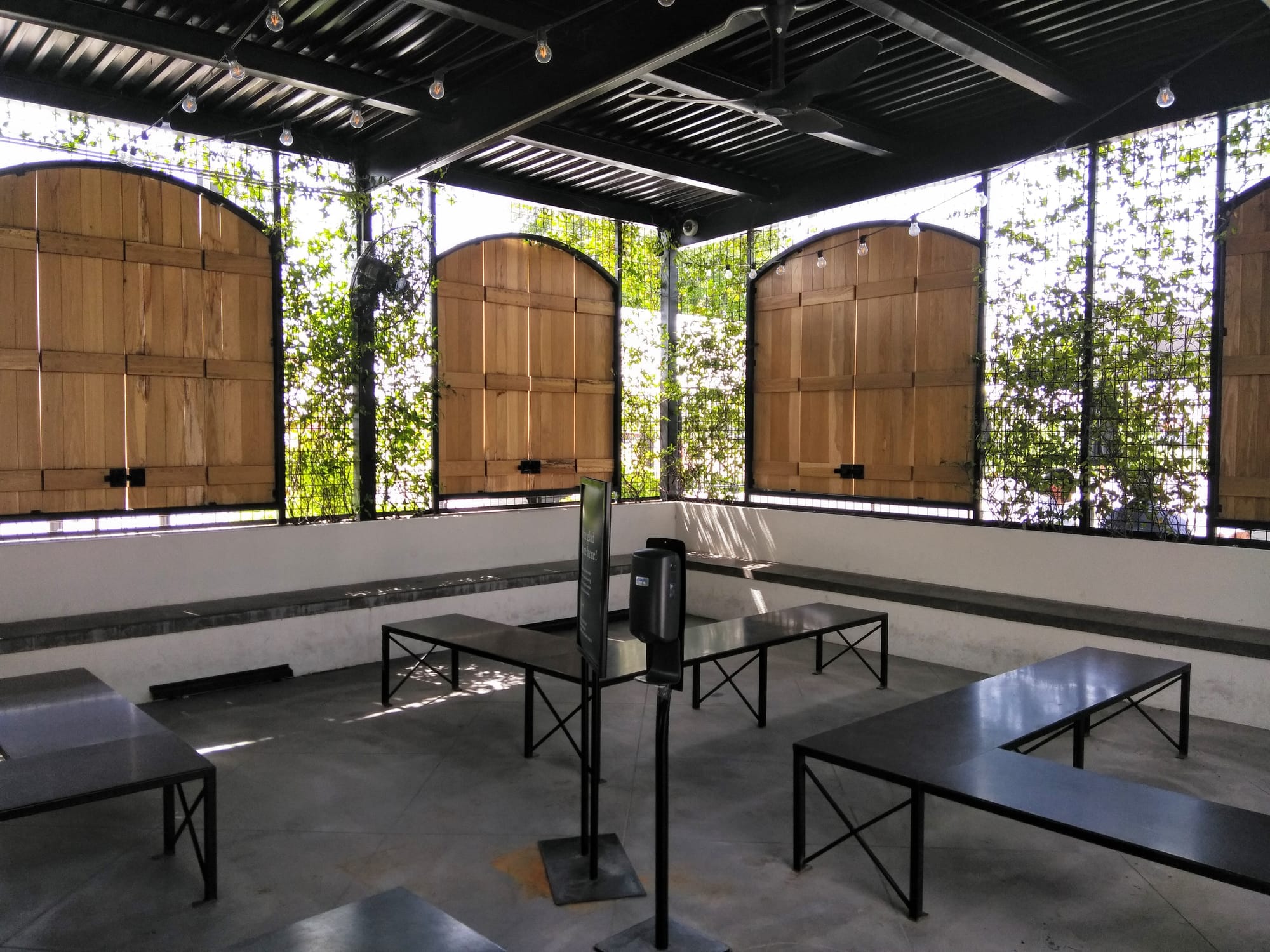 Exterior covered waiting area for Magnolia Table, a local Waco restaurant