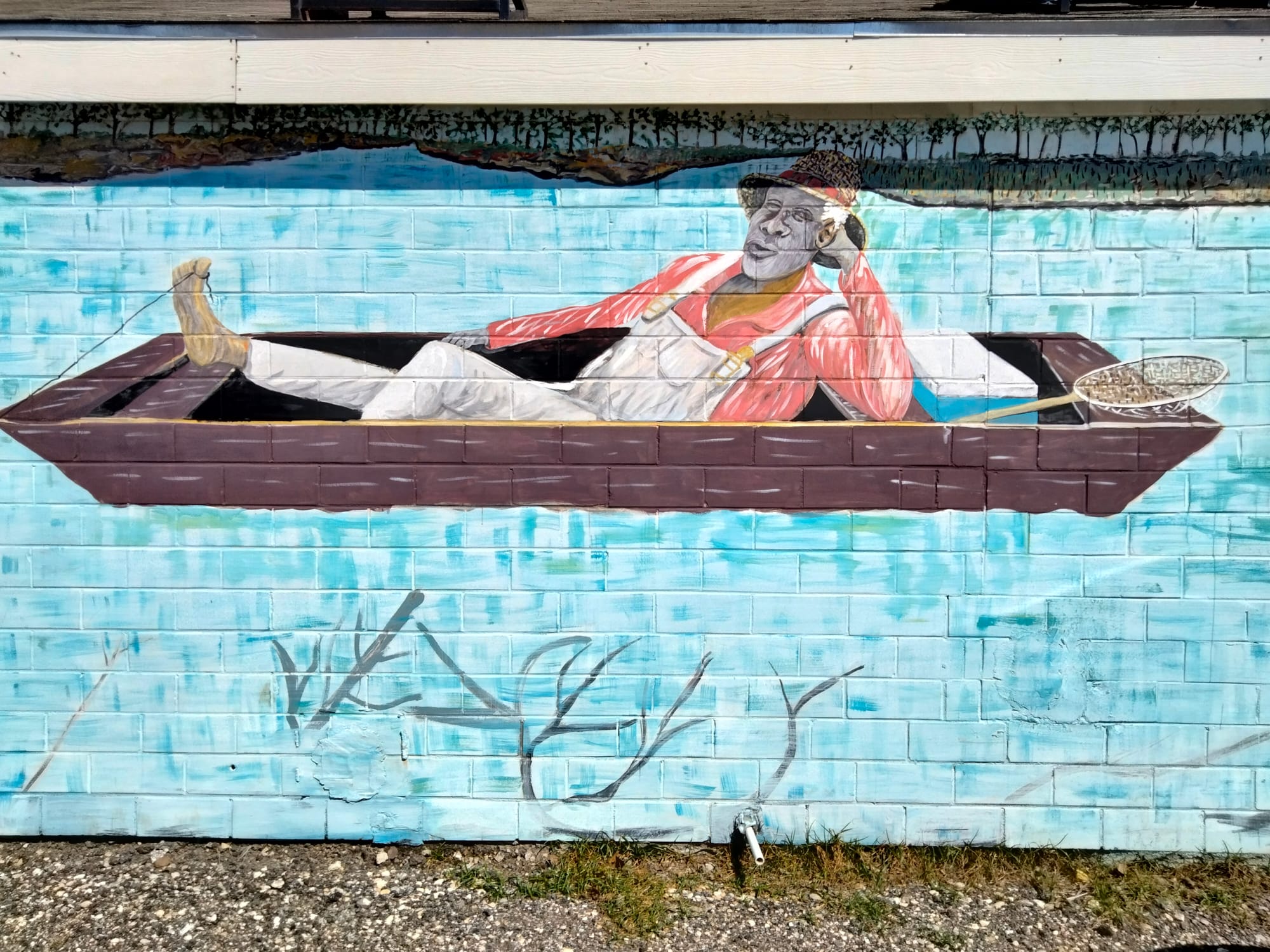 Mural on the wall of Tru Jamaica, one of the best places to eat in Waco, TX