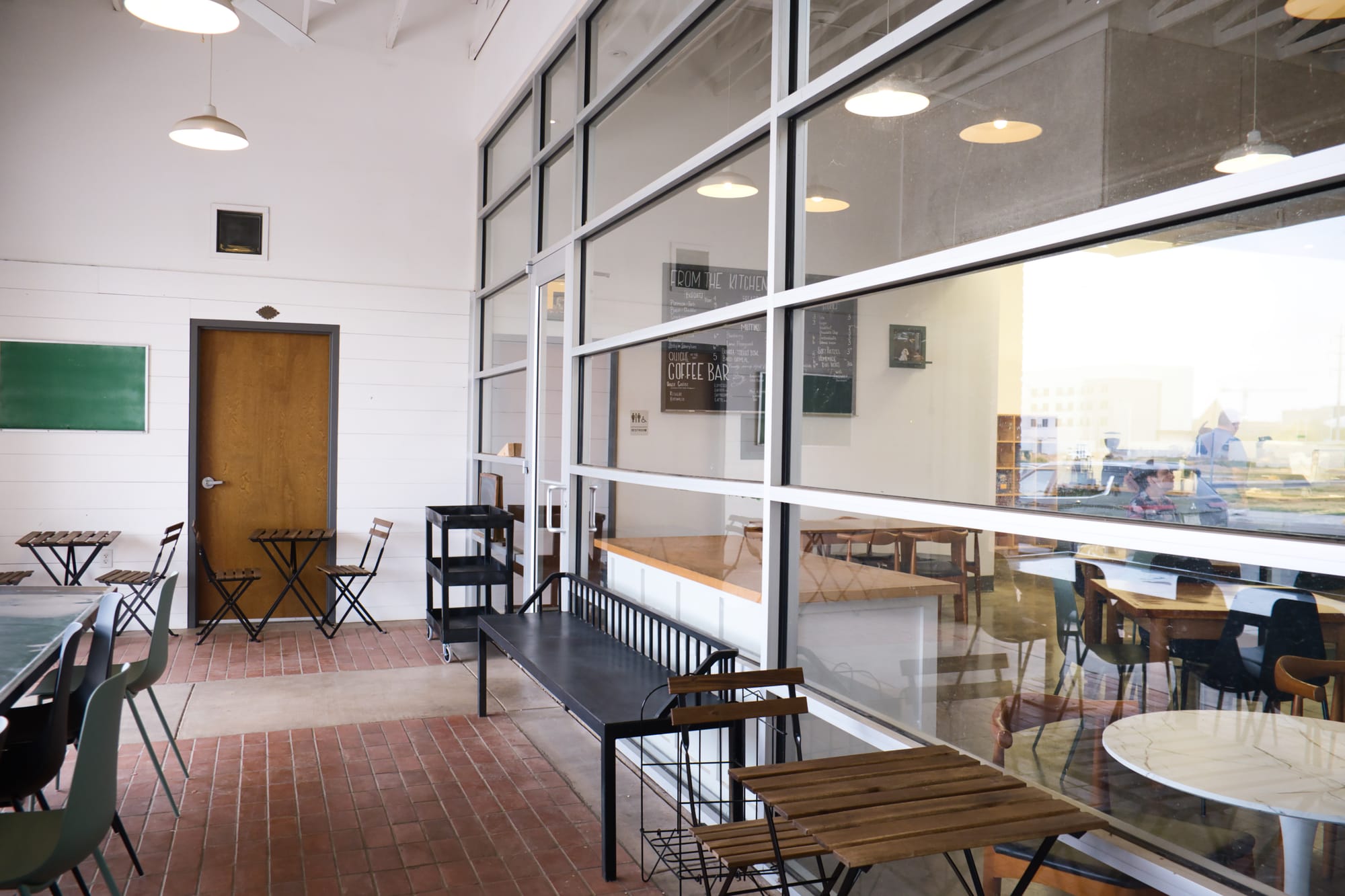 Looking into Street Dog Cafe through the wall-to-ceiling window