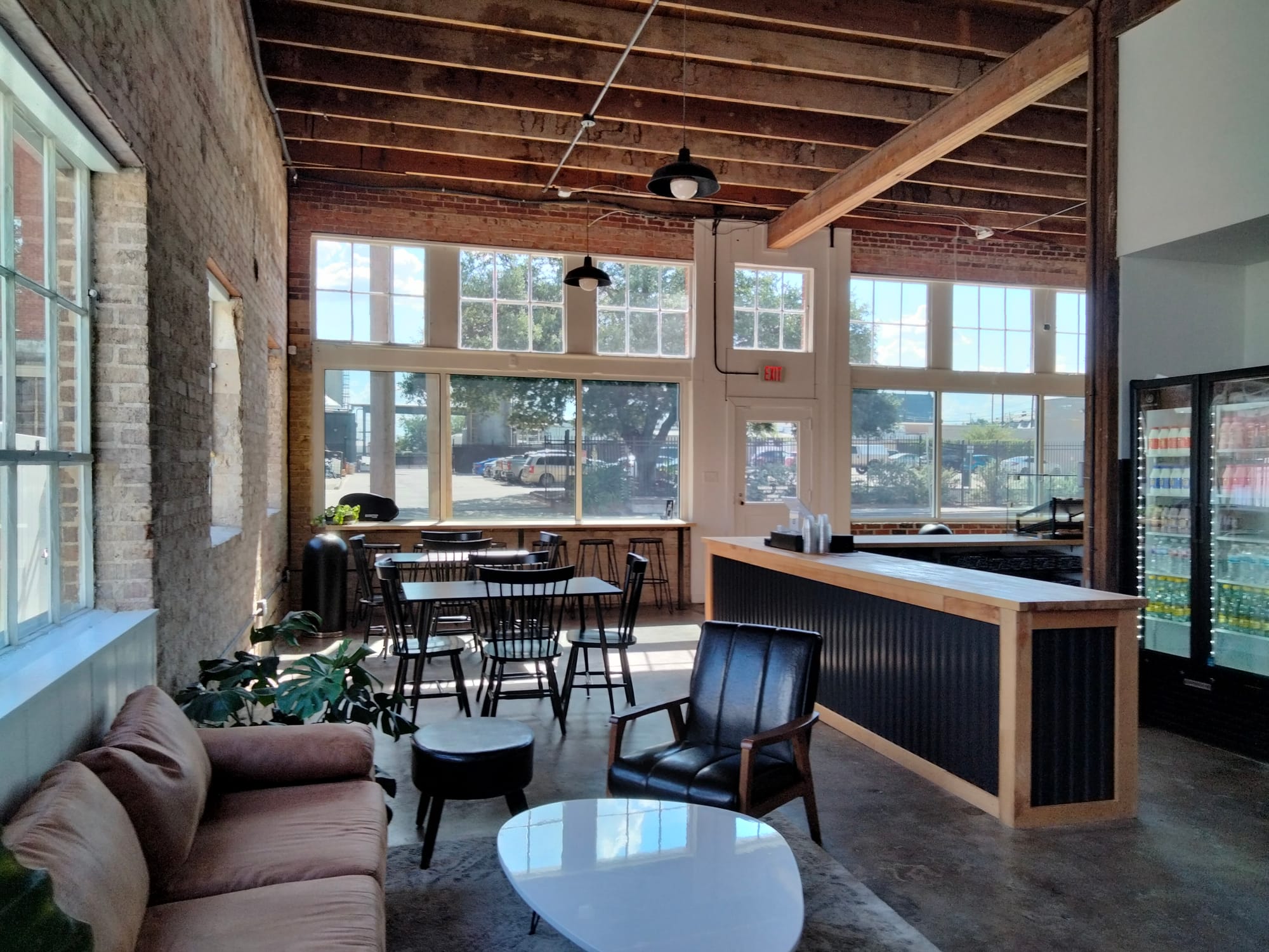 Inside Milk Chocolate Cookies cafe and bakery in Waco, TX with sofa, chairs and tables