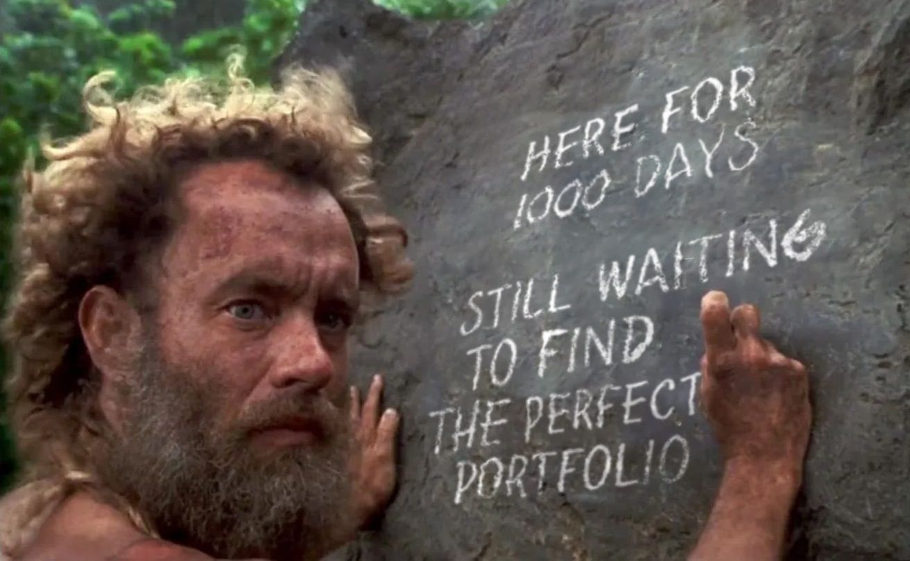 Man deserted on island writing "Here for 1000 days... still waiting to find the perfect portfolio"