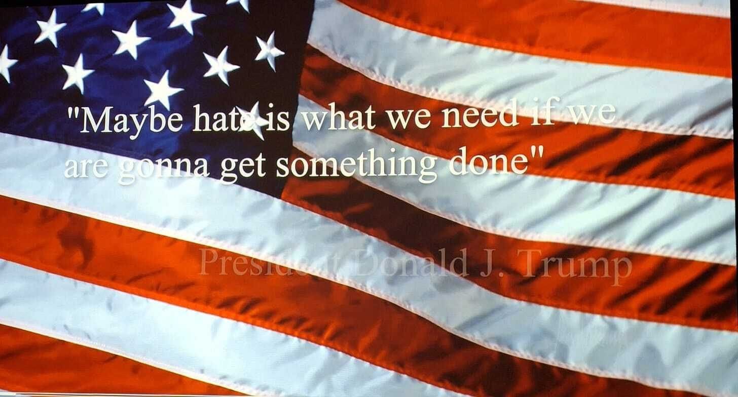 Trump's quote with the american flag as background in his Groningen museum exhibition