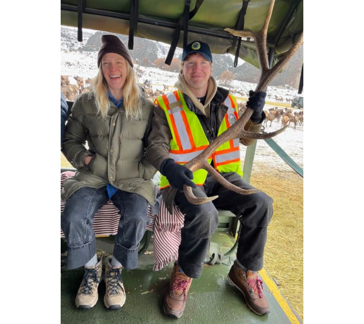 Photo of Ann and Nick with shedded elk horn (Sandra Dean)