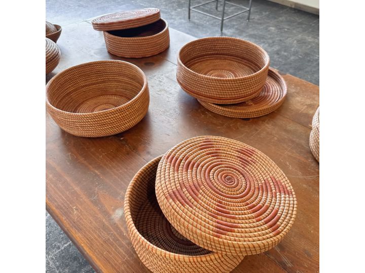Photo of ine needle baskets by artist Alma Gomez