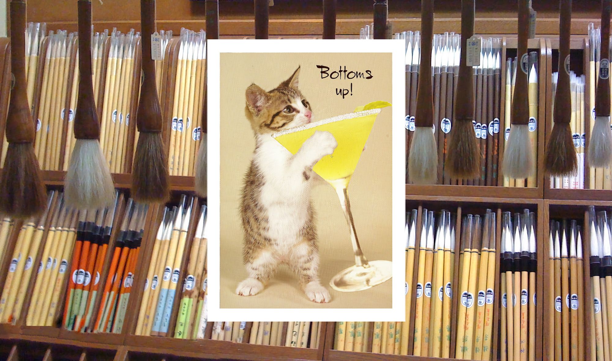 Photo of brushes with cat and martini