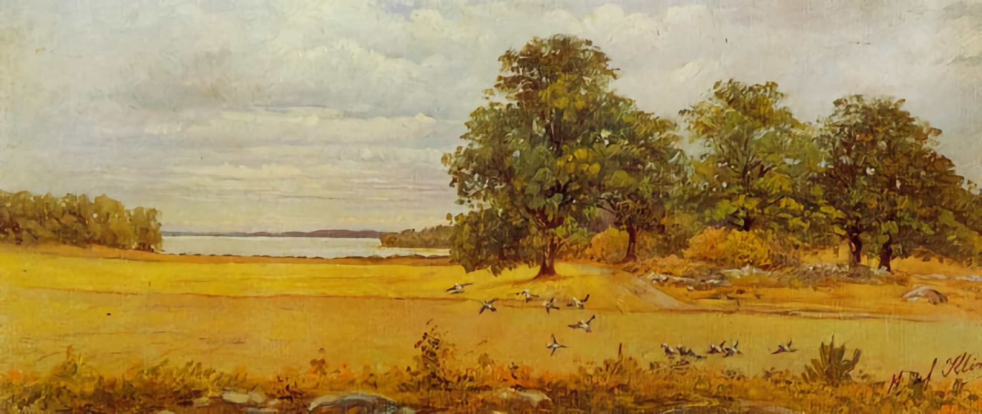 Latte summer landscape of golden meadow in foreground, trees back right, and lake back left, with birds flying in front right.