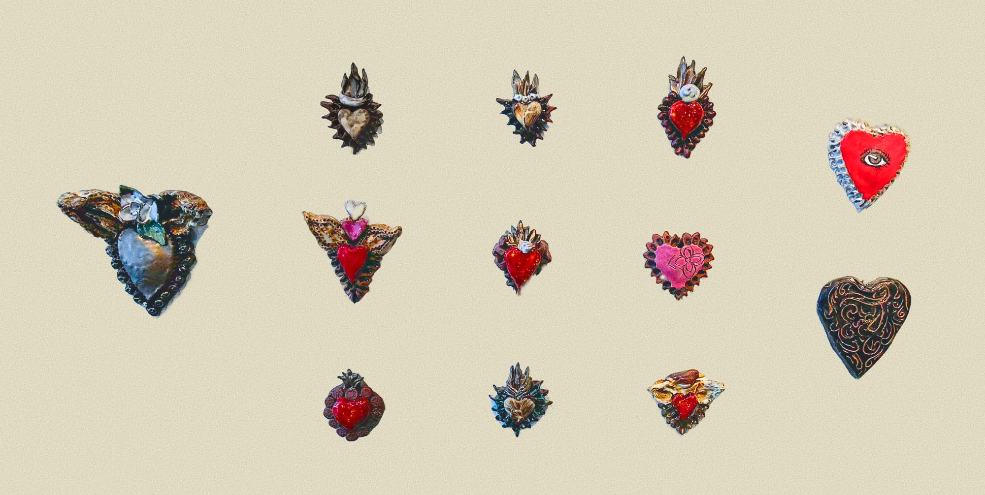 A collection of small ceramic colored valentine plaques