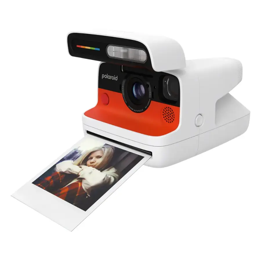 Polaroid instant camera with picture coming out.