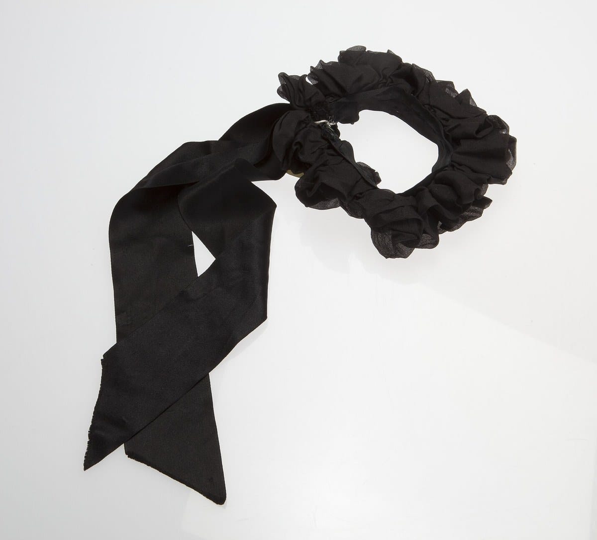 Nineteenth century black crape mourning neckband with long black satin streamers, museum object photograph