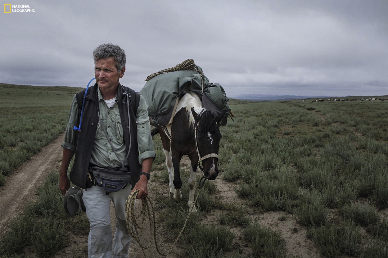 Pulitzer Prize-winning journalist and National Geographic Fellow Paul Salopek and his walking companion, Alex Moen, climbing the steppes in the Mangystau region of Kazakhstan. Join the journey at outofedenwalk.org. Photograph by John Stanmeyer / National Geographic