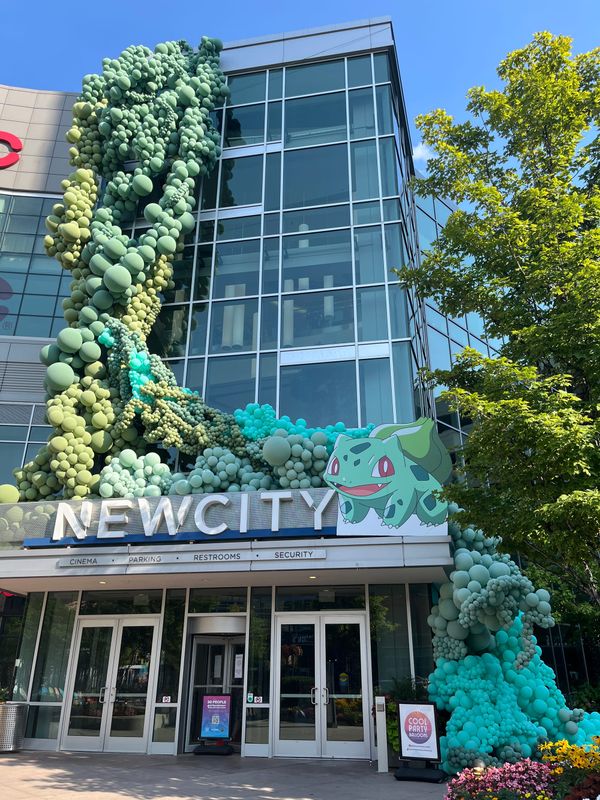 What’s That Green Thing Crawling Up the NEW CITY Building!?