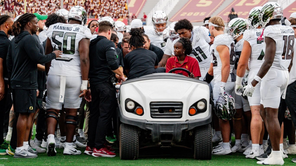 Photographer Captures The Moments After Dante Moore's Injury