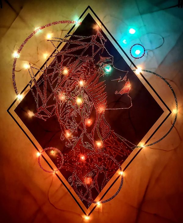 Light up portrait with a face facing right made of colored geometric elements