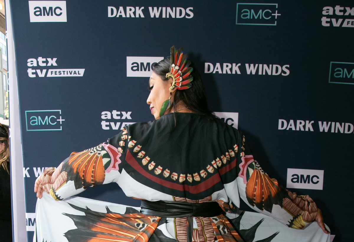 Dark Winds actor Amelia Rico (Ada Growing Thunder), wearing a wrap by J. Okuma and an earring by Tochtli Wear. 