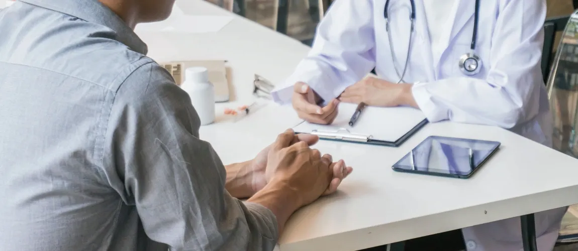 Darstellung eines Arzt-Patienten-Gesprächs.