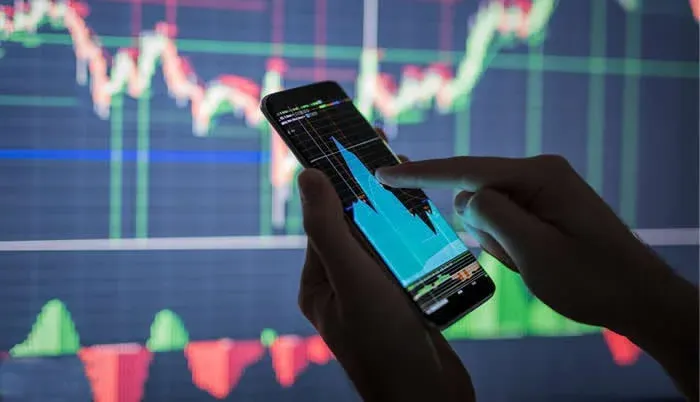 Multiple cryptocurrency logos and exchange platform interface
