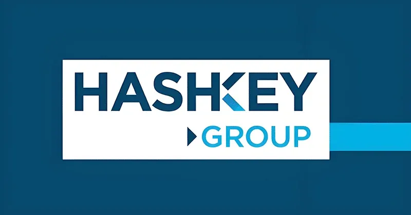 Fachada do prédio da sede do HashKey Group com o horizonte financeiro de Hong Kong